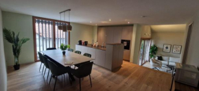 Visionary Hospitality Bassersdorf, Zürich - Premium Apartments in Swiss Style with Free Parking, Washer, Kitchen, Terrace, Vaulted Cellar Event Room, 15' City & Airport